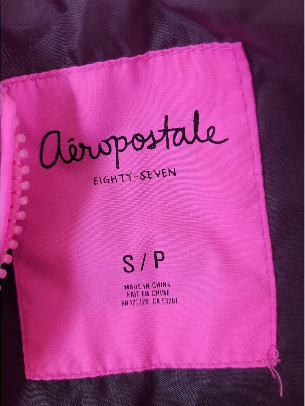 Women’s Pink and Yellow Aeropostale puffer vest size small
